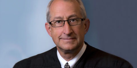 Justice Bruce Zager (Retired)